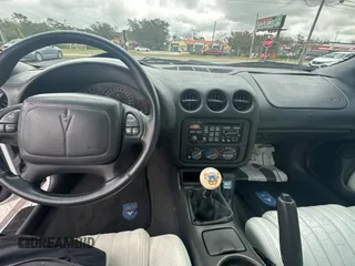 1999 Pontiac Firebird Formula with VIN 2G2FV22G7X2220315, listed as a Copart auction lot 46482085 with 107,524 mi miles and Clean Title. Bid and sale history available at carsss.com. Image 9.