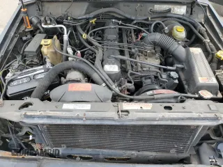 1999 Jeep Cherokee Sport with VIN 1J4FF68S9XL635836, listed as a Copart auction lot 59573195 with 187,035 mi miles and Salvage title. Bid and sale history available at DreamBid. Image 12.