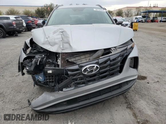 2022 Hyundai Tucson SEL z VIN 5NMJFCAE5NH147033, wystawiony jako Copart lot #50194695 z przebiegiem 30 178 mil mil oraz Szkoda całkowita • Salvage title. Historia ofert i sprzedaży dostępna na DreamBid. Obrazek 5.