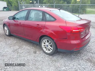 2016 Ford Focus SE z VIN 1FADP3F27GL241382, wystawiony jako IAAI lot #42790565 z przebiegiem 149 762 mil mil oraz . Historia ofert i sprzedaży dostępna na DreamBid. Obrazek 3.