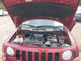 2014 Jeep Patriot Sport with VIN 1C4NJPBBXED617934, listed as a IAAI auction lot 42001839 with 117,306 mi miles. Bid and sale history available at carsss.com. Image 10.