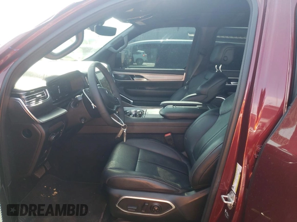 2023 Jeep Wagoneer Series II Carbide with VIN 1C4SJVBP1PS569158, listed as a Copart auction lot 57888145 with 23,613 mi miles and Salvage title. Bid and sale history available at DreamBid. Image 7.