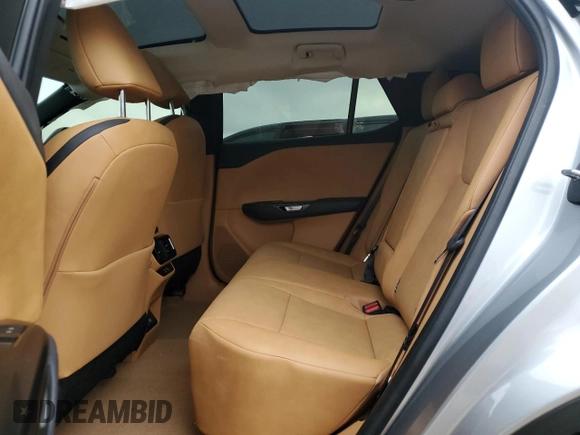 2024 Lexus RZ 300e Premium z VIN JTJABABB2RA000668, wystawiony jako Copart lot #71710714 z przebiegiem 9387 mil mil oraz Szkody całkowita. Historia ofert i sprzedaży dostępna na DreamBid. Obrazek 11.
