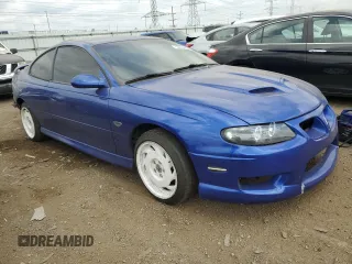 2004 Pontiac GTO z VIN 6G2VX12G04L223636, wystawiony jako Copart lot #56859295 z przebiegiem 183 192 mil mil oraz Szkody całkowita. Historia ofert i sprzedaży dostępna na DreamBid. Obrazek 4.