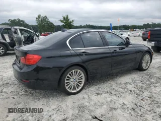 2014 BMW 3 Series 328i with VIN WBA3A5G54ENP31997, listed as a Copart auction lot 60720765 with 107,183 mi miles and Salvage title. Bid and sale history available at DreamBid. Image 3.