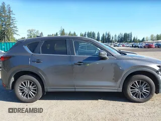 2021 Mazda CX-5 Touring with VIN JM3KFBCM7M1370676, listed as a IAAI auction lot 41975127 with 41,574 mi miles. Bid and sale history available at carsss.com. Image 14.