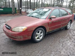 2001 Ford Taurus SE Standard with VIN 1FAFP58U91A290623, listed as a IAAI auction lot 41503243 with 117,194 mi miles. Bid and sale history available at carsss.com. Image 2.