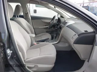 2011 Toyota Corolla L with VIN JTDBU4EE7B9162022, listed as a IAAI auction lot 42066643 with 124,384 mi miles. Bid and sale history available at carsss.com. Image 5.
