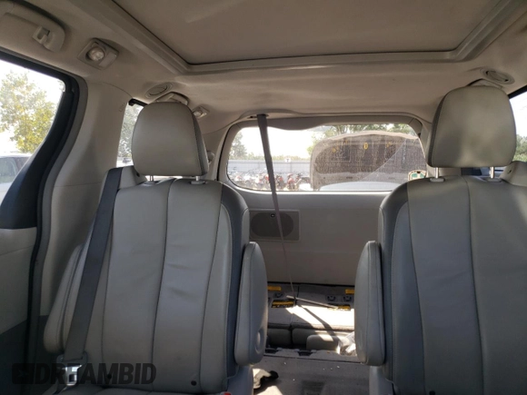 2013 Toyota Sienna XLE with VIN 5TDDK3DC1DS056128, listed as a Copart auction lot 65143524 with 64,132 mi miles and Salvage title. Bid and sale history available at DreamBid. Image 10.