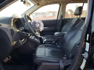 2014 Jeep Compass High Altitude with VIN 1C4NJCEAXED680799, listed as a Copart auction lot 89081285 with 63,447 mi miles and Salvage Title. Bid and sale history available at carsss.com. Image 7.