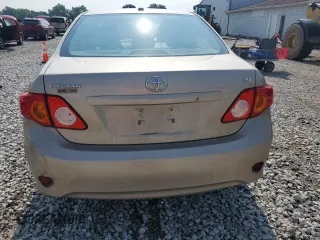 2010 Toyota Corolla with VIN 2T1BU4EE1AC496779, listed as a Copart auction lot 62854035 with 158,502 mi miles and Salvage title. Bid and sale history available at DreamBid. Image 6.