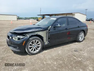 2018 BMW 3 Series 320i with VIN WBA8E1G58JNU92404, listed as a Copart auction lot 52757725 with 74,712 mi miles and Salvage title. Bid and sale history available at DreamBid. Image 1.
