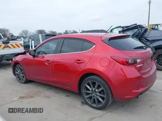2018 Mazda 3 Touring with VIN 3MZBN1L37JM167604, listed as a IAAI auction lot 41623232 with 118,974 mi miles. Bid and sale history available at carsss.com. Image 15.