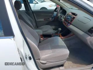 2004 Toyota Camry LE with VIN JTDBE32KX40279599, listed as a IAAI auction lot 42202160 with 288,879 mi miles and . Bid and sale history available at carsss.com. Image 5.