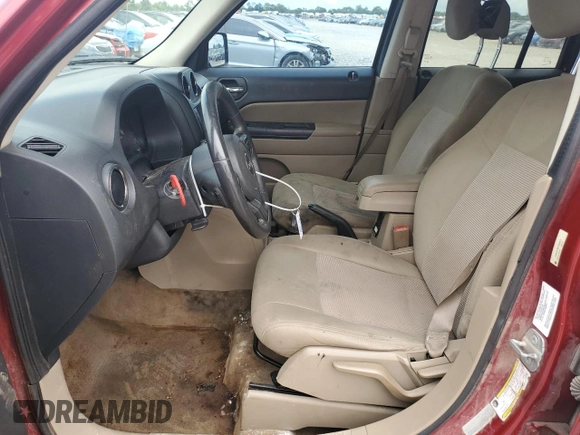 2014 Jeep Patriot Latitude with VIN 1C4NJRFB8ED845677, listed as a Copart auction lot 66019864 with 188,587 mi miles and Salvage Title. Bid and sale history available at carsss.com. Image 7.