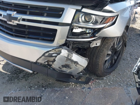 2019 Chevrolet Tahoe LT with VIN 1GNSCBKC0KR240660, listed as a IAAI auction lot 42265044 with 109,720 mi miles and . Bid and sale history available at DreamBid. Image 6.