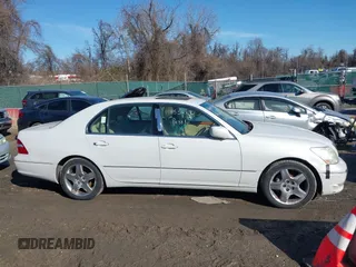 2005 Lexus LS 430 z VIN JTHBN36F855003387, wystawiony jako IAAI lot #41455883 z przebiegiem 279 683 mil mil oraz . Historia ofert i sprzedaży dostępna na DreamBid. Obrazek 13.