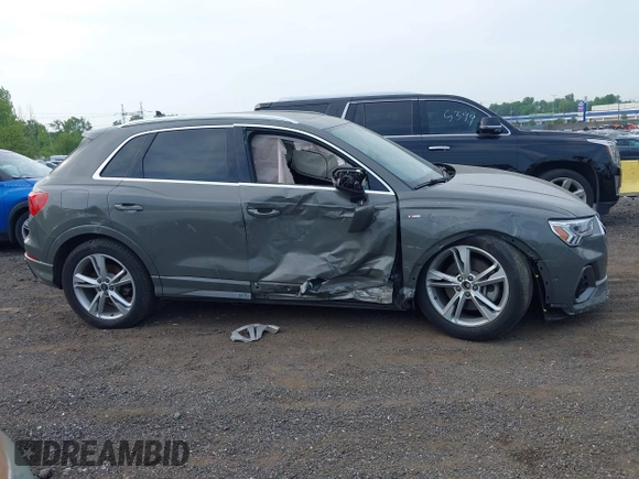 2021 Audi Q3 S line Premium Plus z VIN WA1EECF3XM1039439, wystawiony jako IAAI lot #42400021 z przebiegiem 41 740 mil mil oraz . Historia ofert i sprzedaży dostępna na DreamBid. Obrazek 13.