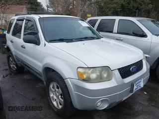 2007 Ford Escape XLT with VIN 1FMYU03197KB80133, listed as a IAAI auction lot 41084715 with 185,132 mi miles and . Bid and sale history available at DreamBid. Image 1.