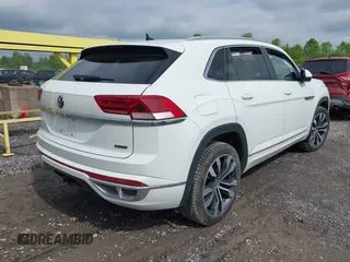 2021 Volkswagen Atlas SEL z VIN 1V2SE2CA7MC214805, wystawiony jako IAAI lot #42374591 z przebiegiem 61 775 mil mil oraz . Historia ofert i sprzedaży dostępna na DreamBid. Obrazek 4.