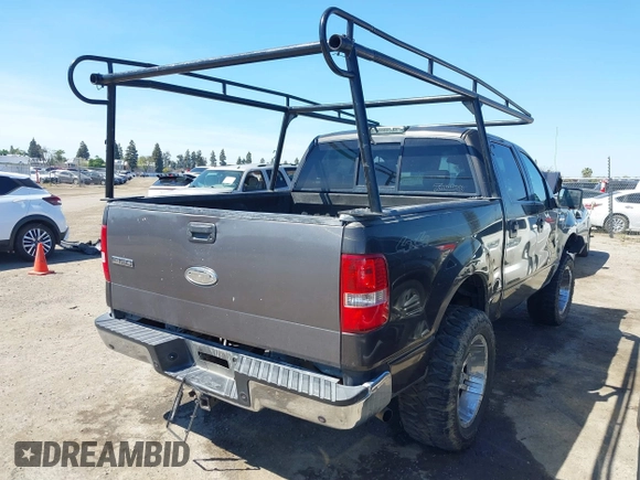 2005 Ford F-150 XLT with VIN 1FTPW14595FB23003, listed as a IAAI auction lot 41881364 with 228,464 mi miles. Bid and sale history available at carsss.com. Image 4.