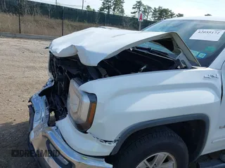 2017 GMC Sierra 1500 SLE z VIN 1GTV2MEC0HZ291794, wystawiony jako IAAI lot #42055172 z przebiegiem 235 969 mil mil oraz . Historia ofert i sprzedaży dostępna na DreamBid. Obrazek 18.