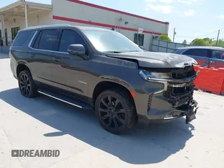 2021 Chevrolet Tahoe LT z VIN 1GNSCNKD8MR183394, wystawiony jako IAAI lot #41921631 z przebiegiem 79 842 mil mil oraz . Historia ofert i sprzedaży dostępna na DreamBid. Obrazek 1.