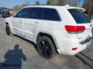 2015 Jeep Grand Cherokee Altitude with VIN 1C4RJFAG1FC797157, listed as a IAAI auction lot 42021139 with 148,491 mi miles. Bid and sale history available at carsss.com. Image 3.