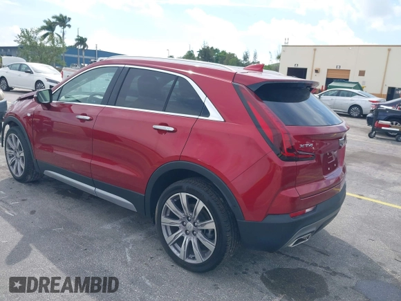 2021 Cadillac XT4 FWD Premium Luxury with VIN 1GYFZCR41MF043072, listed as a IAAI auction lot 41769251 with 31,053 mi miles. Bid and sale history available at carsss.com. Image 3.