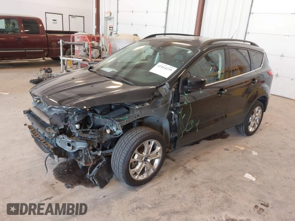 2014 Ford Escape SE with VIN 1FMCU9G95EUA16328, listed as a IAAI auction lot 42464235 with 108,570 mi miles and . Bid and sale history available at DreamBid. Image 17.