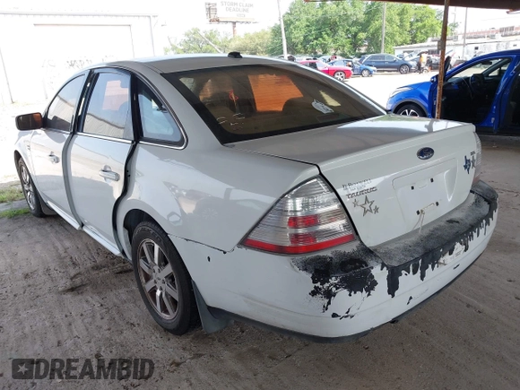 2008 Ford Taurus SEL z VIN 1FAHP24W68G143505, wystawiony jako IAAI lot #41932592 z przebiegiem 238 542 mil mil oraz . Historia ofert i sprzedaży dostępna na DreamBid. Obrazek 3.