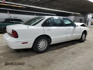1998 Oldsmobile 88 LS z VIN 1G3HN52K9W4823866, wystawiony jako Copart lot #49150535 z przebiegiem 54 125 mil mil oraz Szkody całkowita. Historia ofert i sprzedaży dostępna na DreamBid. Obrazek 3.