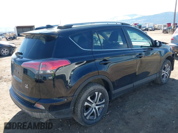 2017 Toyota RAV4 LE with VIN 2T3BFREV2HW543163, listed as a IAAI auction lot 41875755 with 96,398 mi miles and . Bid and sale history available at carsss.com. Image 4.
