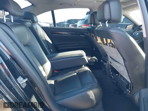 2013 BMW 7 Series 740i with VIN WBAYA6C55DC995094, listed as a IAAI auction lot 41246796 with 164,394 mi miles. Bid and sale history available at carsss.com. Image 8.