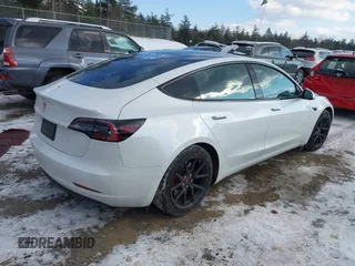 2020 Tesla Model 3 Standard Range Plus with VIN 5YJ3E1EA7LF742973, listed as a IAAI auction lot 41409285 with 48,993 mi miles and . Bid and sale history available at DreamBid. Image 4.