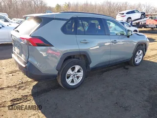 2021 Toyota RAV4 XLE with VIN 2T3W1RFV8MW152785, listed as a IAAI auction lot 41401709 with 55,069 mi miles. Bid and sale history available at carsss.com. Image 4.