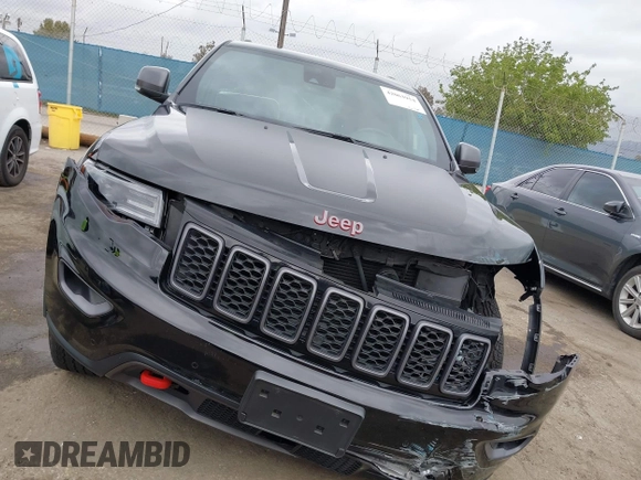 2021 Jeep Grand Cherokee Trailhawk with VIN 1C4RJFLT4MC771773, listed as a IAAI auction lot 42063954 with 17,920 mi miles and . Bid and sale history available at DreamBid. Image 12.