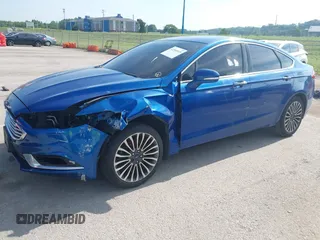 2018 Ford Fusion Titanium with VIN 3FA6P0D92JR205597, listed as a IAAI auction lot 42585935 with 146,072 mi miles and . Bid and sale history available at DreamBid. Image 17.