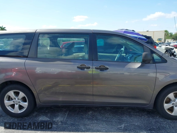 2012 Toyota Sienna with VIN 5TDZK3DC8CS190719, listed as a IAAI auction lot 41983695 with 68,377 mi miles and . Bid and sale history available at DreamBid. Image 14.