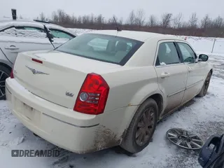2008 Chrysler 300 Touring with VIN 2C3LA53GX8H287584, listed as a IAAI auction lot 41727222 with 166,783 mi miles. Bid and sale history available at carsss.com. Image 4.
