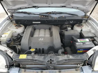 2004 Hyundai Santa Fe GLS with VIN KM8SC73D74U772335, listed as a Copart auction lot 49575564 with 146,840 mi miles and Clean Title. Bid and sale history available at carsss.com. Image 12.