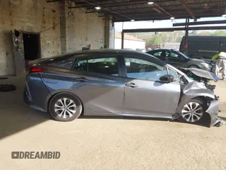 2021 Toyota Prius LE with VIN JTDKAMFP2M3168342, listed as a IAAI auction lot 42132946 with 69,628 mi miles and . Bid and sale history available at DreamBid. Image 14.