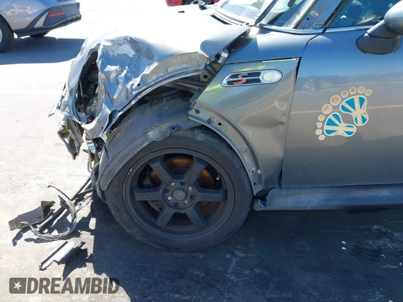 2005 MINI Convertible S with VIN WMWRH33545TF85051, listed as a IAAI auction lot 41843147 with 109,656 mi miles and . Bid and sale history available at DreamBid. Image 14.