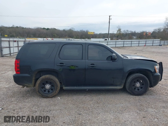 2011 Chevrolet Tahoe Commercial with VIN 1GNLC2E01BR289534, listed as a IAAI auction lot 41670183 with 119,422 mi miles and . Bid and sale history available at DreamBid. Image 14.