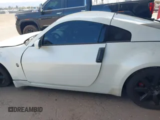 2003 Nissan 350Z Enthusiast with VIN JN1AZ34D43T116381, listed as a IAAI auction lot 41507588 with 195,944 mi miles. Bid and sale history available at carsss.com. Image 14.