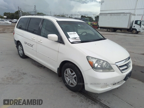 2006 Honda Odyssey EX-L with VIN 5FNRL38756B084148, listed as a IAAI auction lot 41694915 with 164,915 mi miles. Bid and sale history available at carsss.com. Image 1.