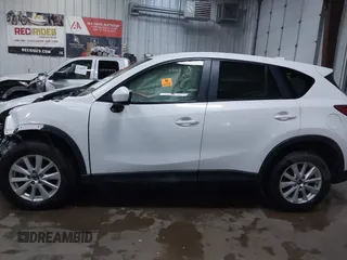 2014 Mazda CX-5 Touring with VIN JM3KE4CY4E0349034, listed as a IAAI auction lot 41478954 with 117,502 mi miles. Bid and sale history available at carsss.com. Image 14.