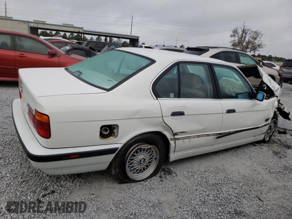 1995 BMW 5 Series 525i z VIN WBAHD6326SGK83552, wystawiony jako Copart lot #45245825 z przebiegiem 181 607 mil mil oraz Szkoda całkowita • Salvage title. Historia ofert i sprzedaży dostępna na DreamBid. Obrazek 3.