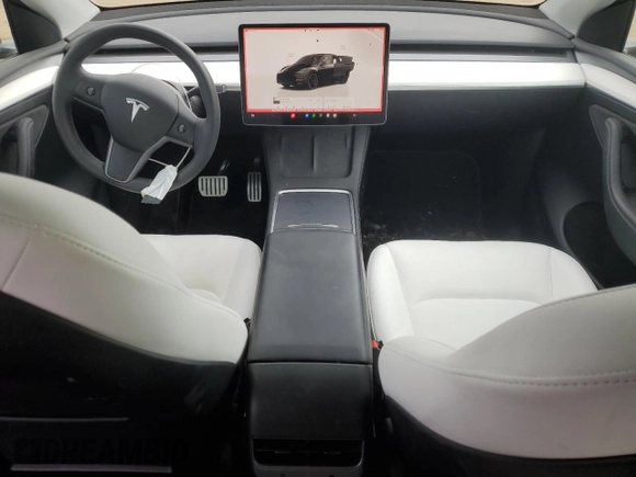 2022 Tesla Model Y Performance with VIN 7SAYGDEF3NF546385, listed as a Copart auction lot 83784984 with 30,769 mi miles and Salvage Title. Bid and sale history available at DreamBid. Image 8.