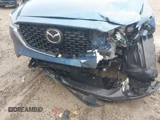 2023 Mazda CX-5 S Carbon Edition z VIN JM3KFBCM4P0264891, wystawiony jako IAAI lot #40933700 z przebiegiem 18 714 mil mil oraz . Historia ofert i sprzedaży dostępna na DreamBid. Obrazek 6.